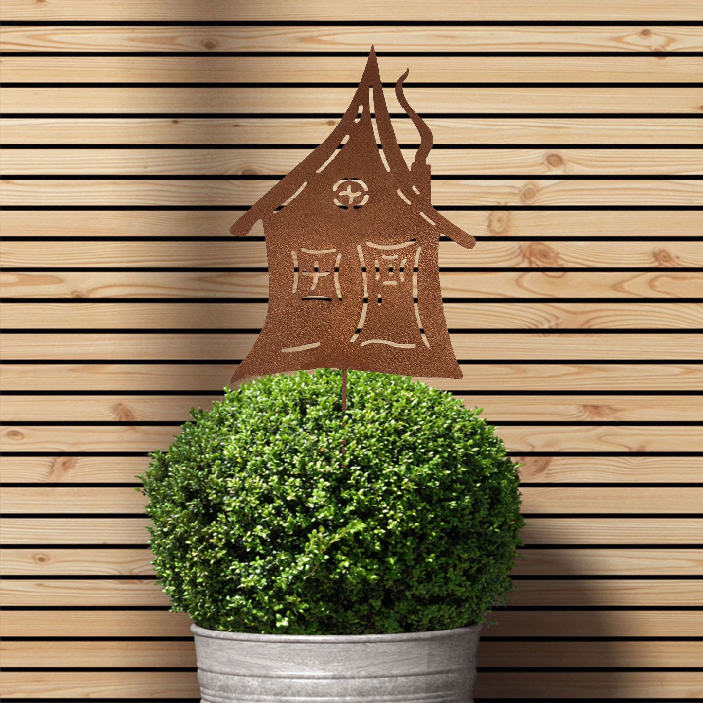 Gartenstecker Hexenhaus