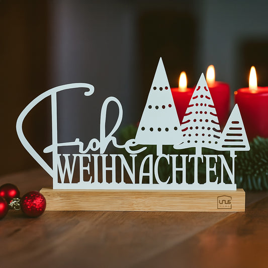 Aufsteller "Frohe Weihnachten" mit Tannenbäumen