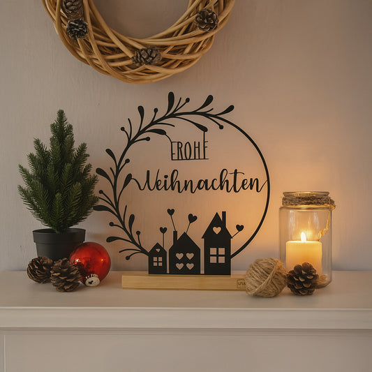 Aufsteller "Frohe Weihnachten" mit Blumenbogen und Häusern schwarz oder weiß