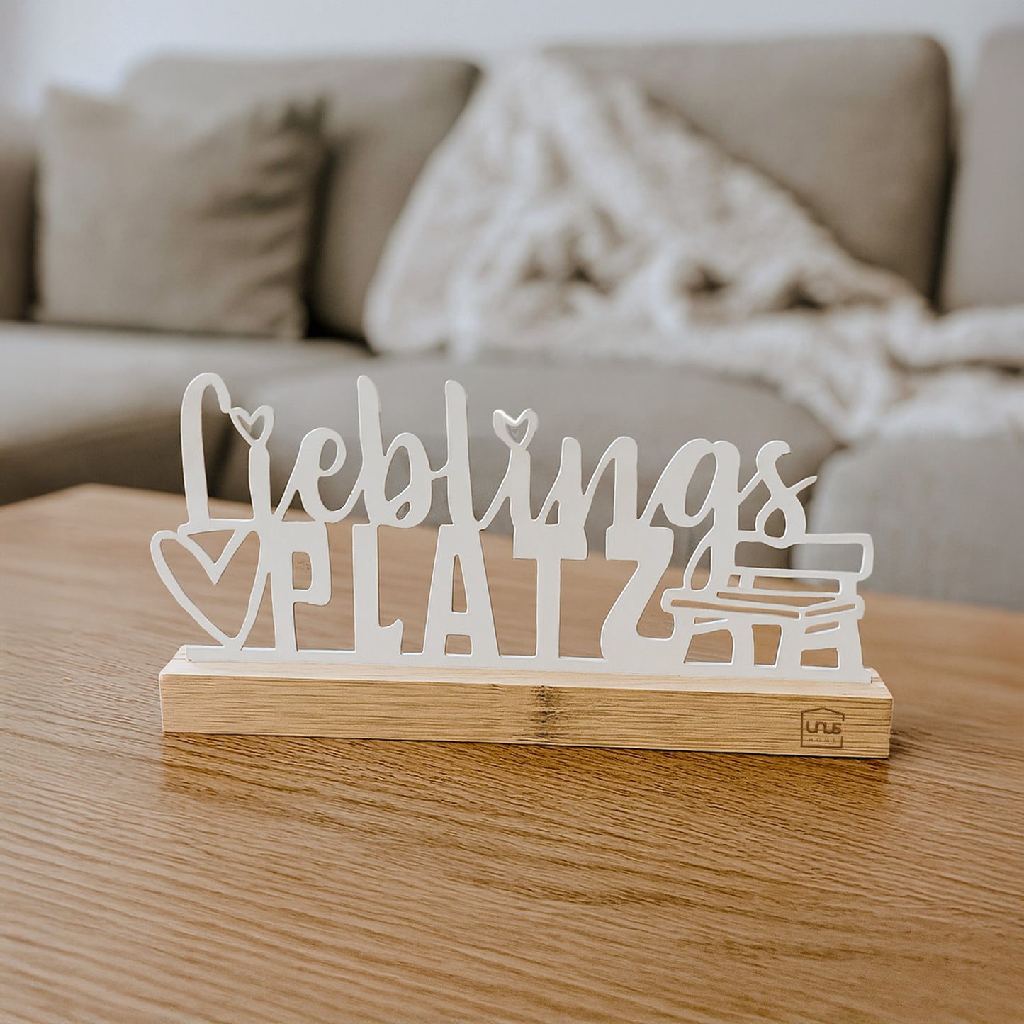 Aufsteller "Lieblings Platz" mit Herz- und Bankmotiv