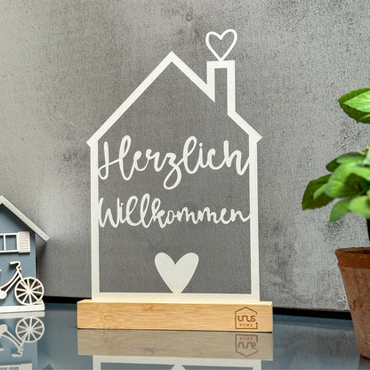 Aufsteller "Herzlich Willkommen" mit Unus Logo in weiß oder schwarz